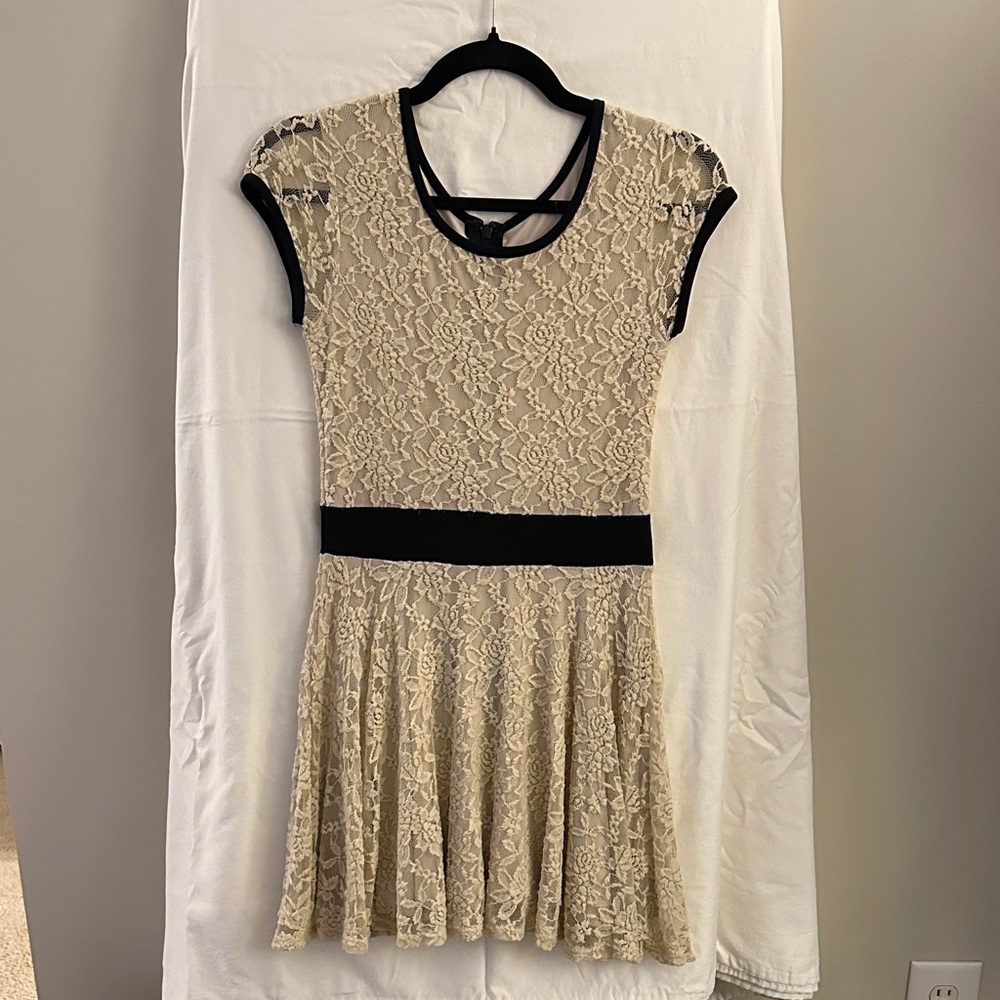 Elegant Lace Dress with Black Accents